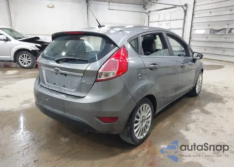 2014 Ford Fiesta Titanium из США, поврежденный, VIN 3FADP4FJ4EM220367
